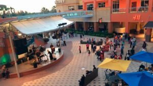 Live music performance at the Dolphin Mall Ramblas outdoor seating area in Miami.
